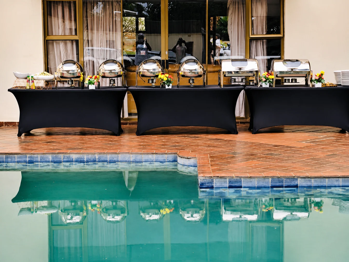 Poolside buffet prepared by Rue's Manor Eats
